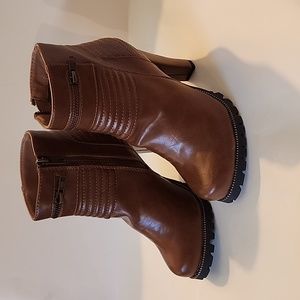 C. Label "Binky" size 5.5 boots.  New